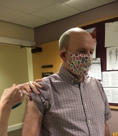 Cllr Dean Clarke receiving his Covid-19 vaccine